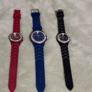Set of Three Stylish Watches in Red, Blue, and Black

Needs  new batteries